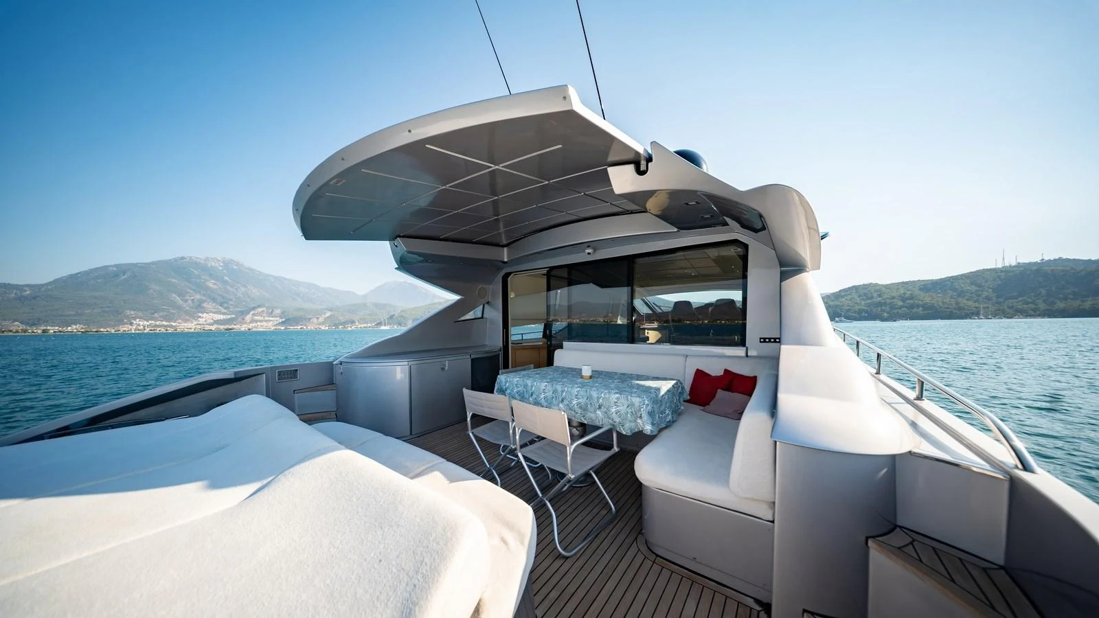 The aft deck offers a spacious and inviting area for relaxation and socializing with stunning views of the surrounding waters. aboard FREEDOM 2 Yacht for Sale