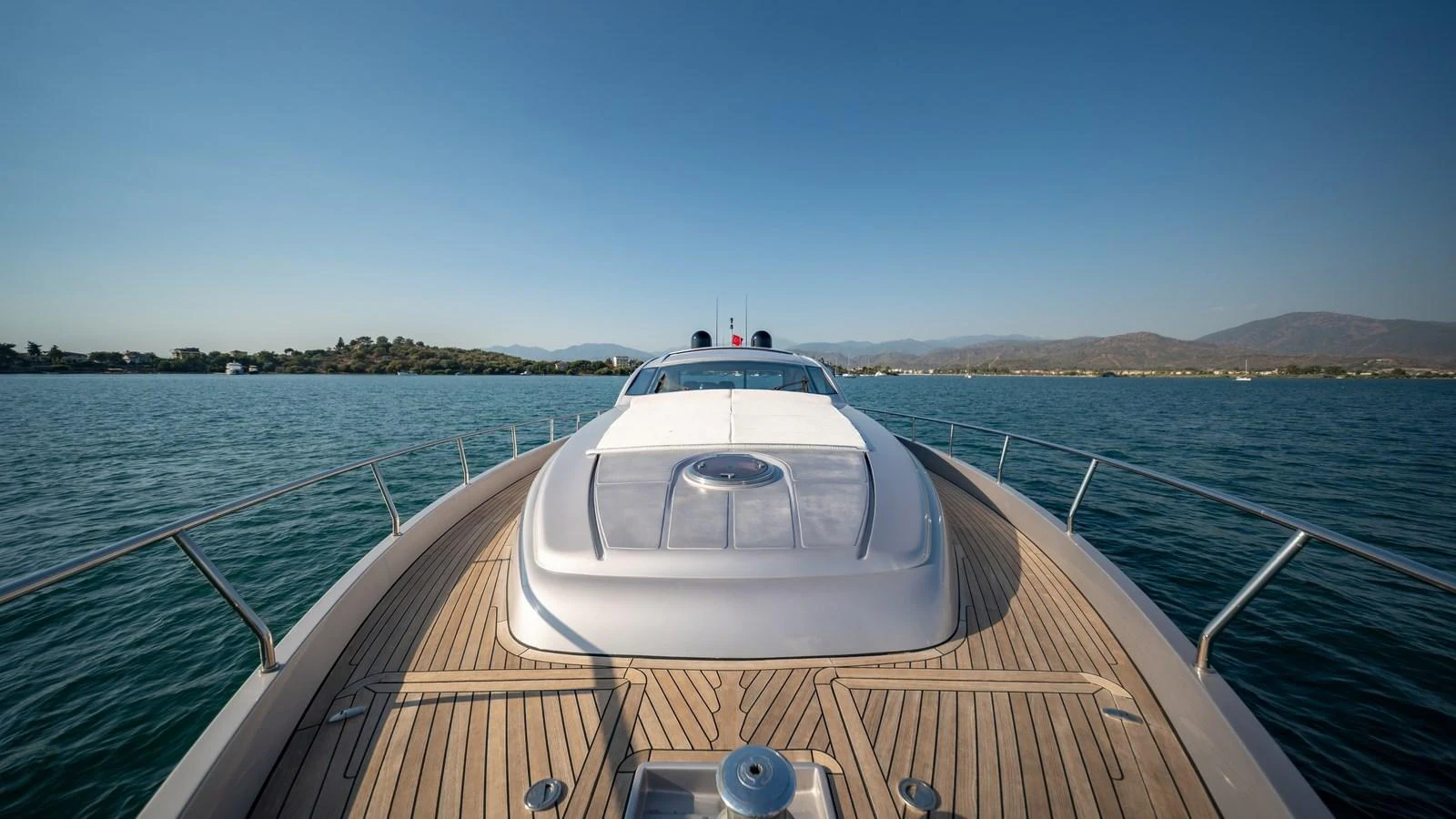 The yacht's sleek foredeck offers a spacious and inviting area for relaxation with stunning views of the surrounding waters. aboard FREEDOM 2 Yacht for Sale
