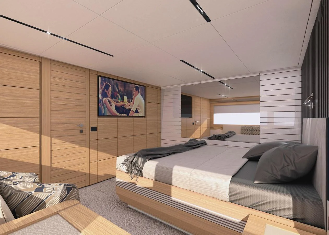 A luxurious stateroom featuring a large bed, modern decor, and a flat-screen TV. aboard FILIPPETTI S100 Yacht for Sale