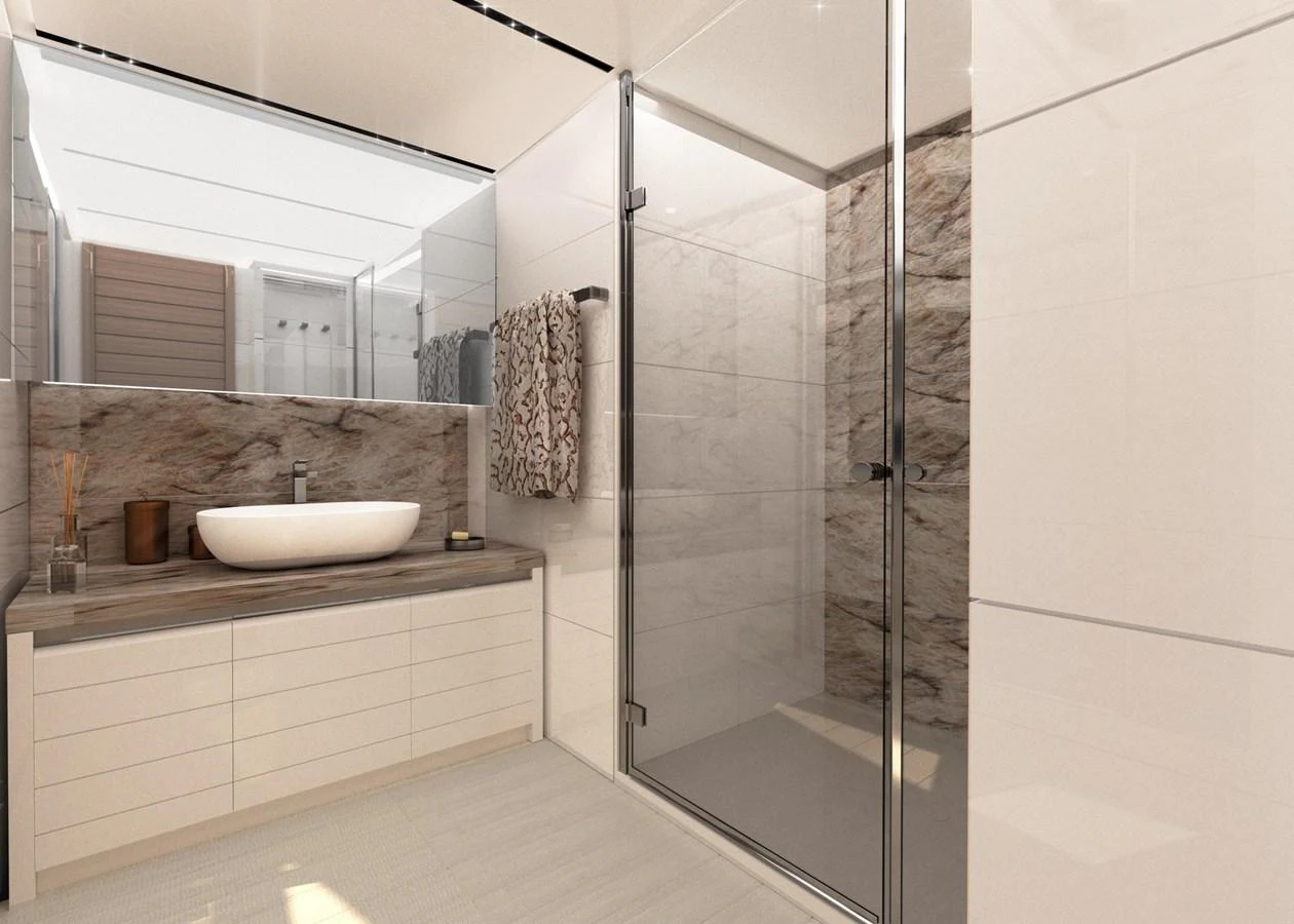 A modern yacht bathroom with a sleek glass shower and elegant fixtures. aboard FILIPPETTI S100 Yacht for Sale