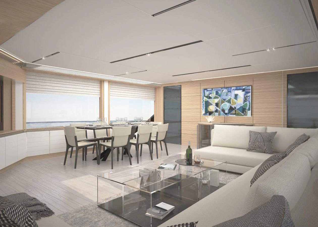 The salon features a spacious and modern design with ample seating and large windows for natural light. aboard FILIPPETTI S100 Yacht for Sale