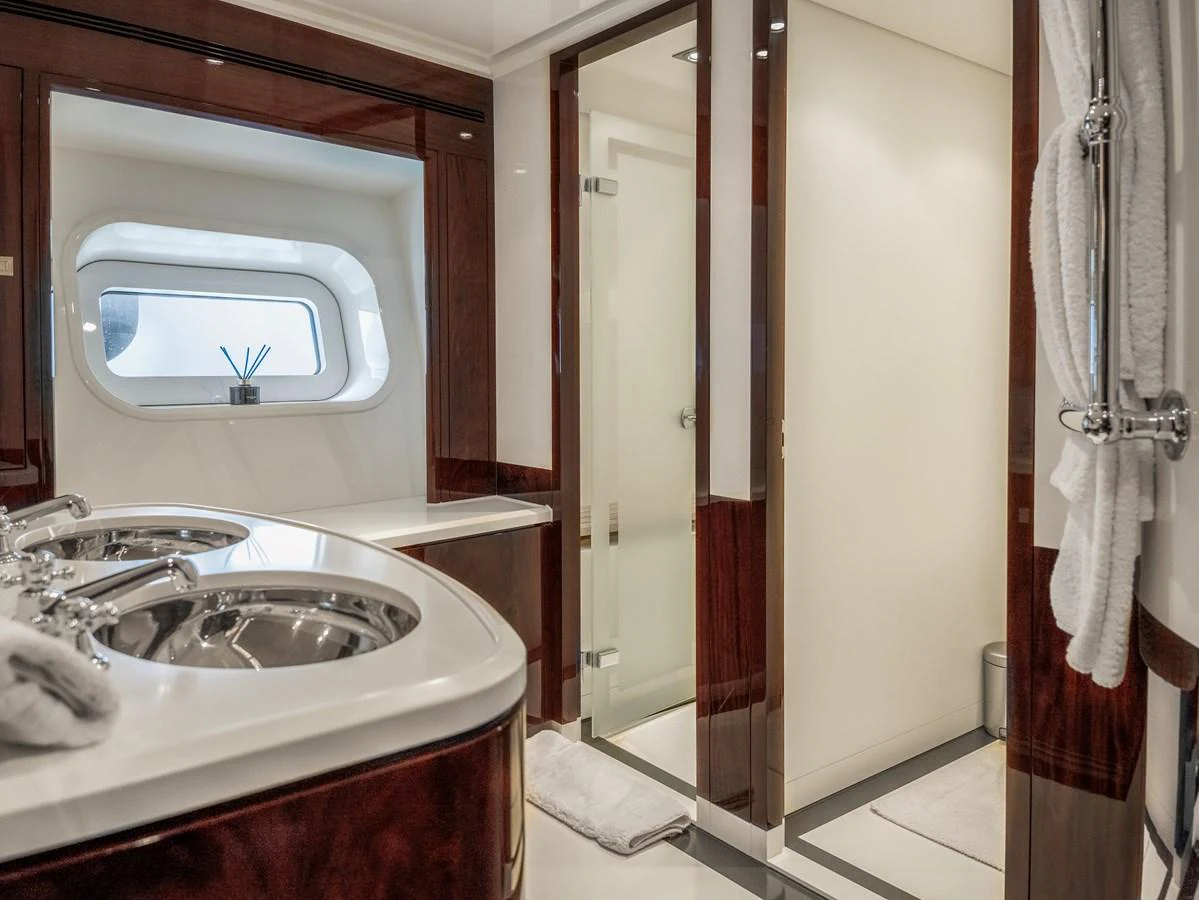 The yacht's bathroom features elegant fixtures and a modern design with ample natural light. aboard VALQUEST Yacht for Sale