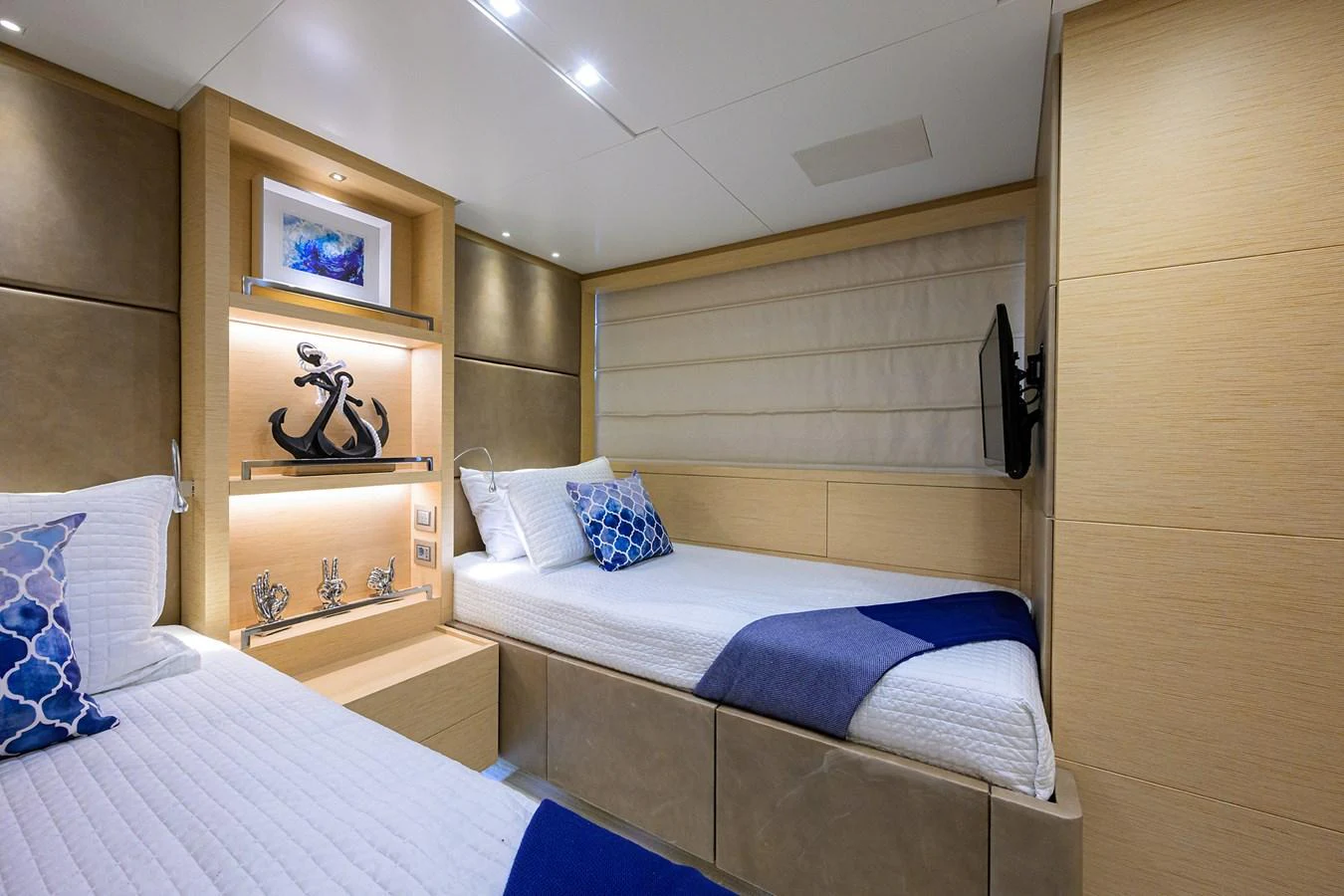 The guest stateroom features twin beds with elegant decor and modern amenities. aboard CHRISTINA Yacht for Sale