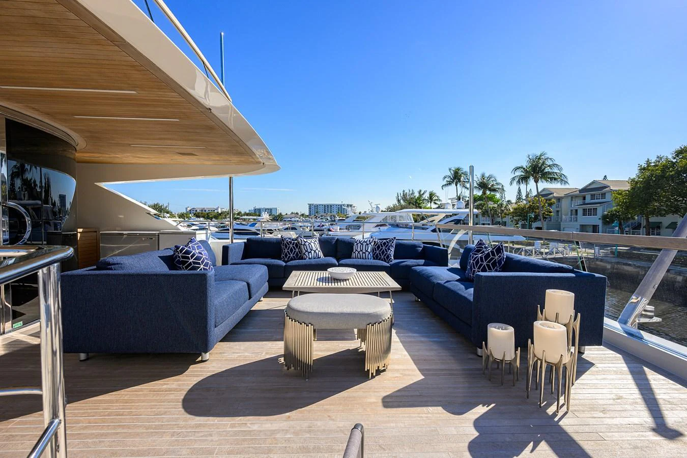 The aft deck features a spacious lounging area with plush seating and stylish decor, perfect for relaxation and socializing. aboard CHRISTINA Yacht for Sale