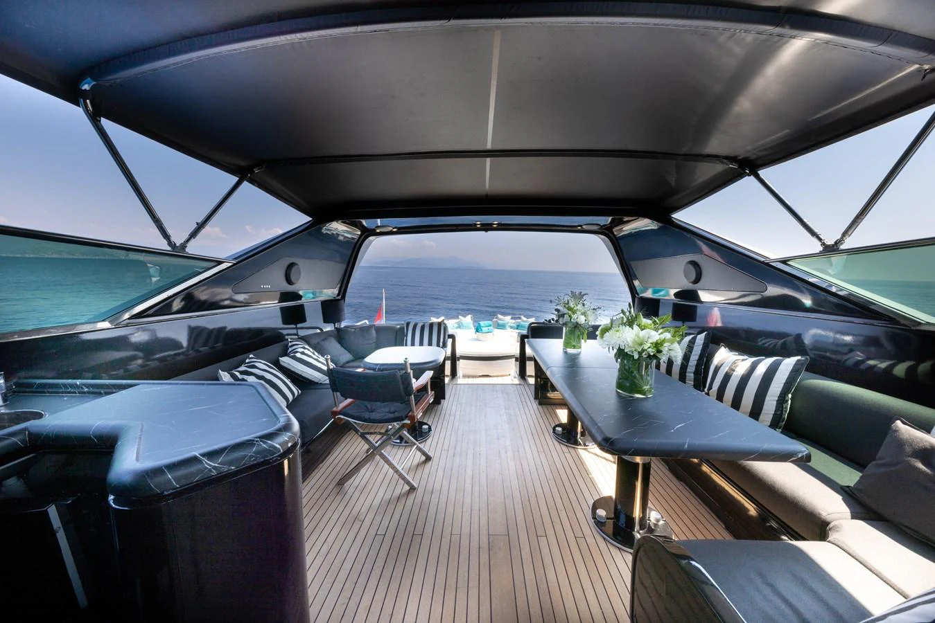 The sundeck offers a spacious and stylish area for relaxation with panoramic views of the sea. aboard LAUREN V Yacht for Sale
