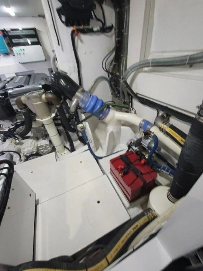 The image showcases the technical and mechanical components within the yacht's engine room. aboard GODSPEED Yacht for Sale