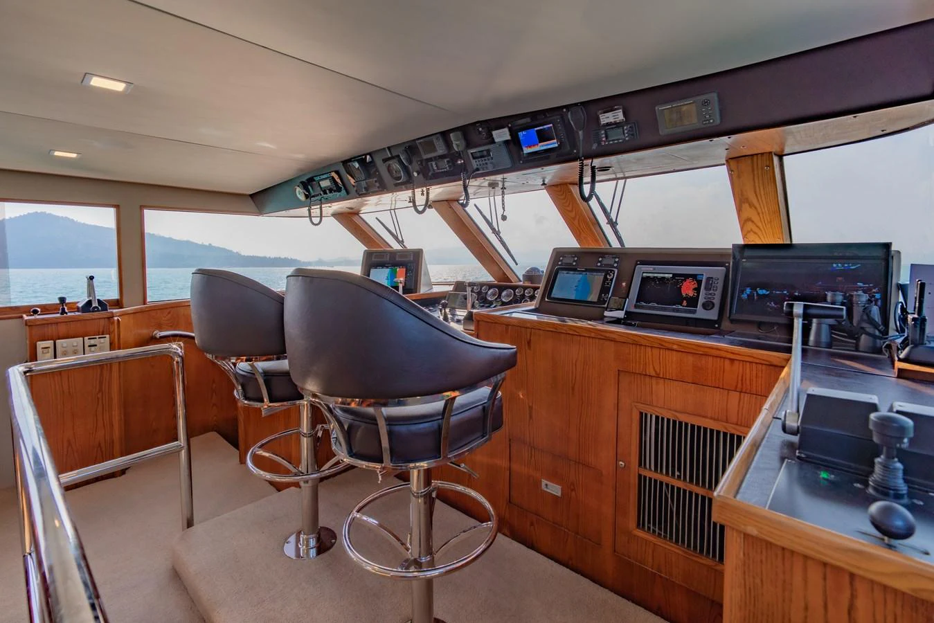 a room with computers and chairs aboard NYMPHAEA Yacht for Sale