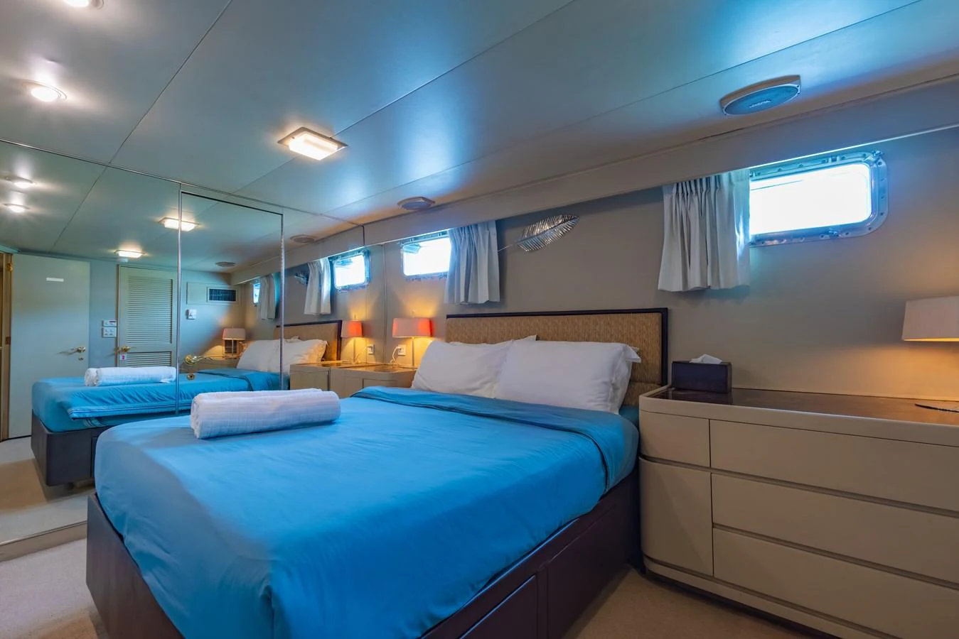 a room with two beds aboard NYMPHAEA Yacht for Sale