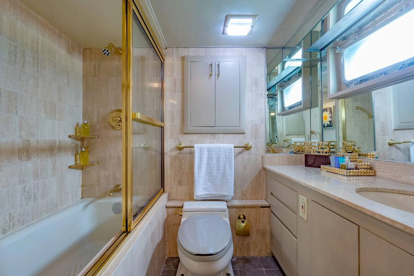 a bathroom with a toilet and sink aboard NYMPHAEA Yacht for Sale