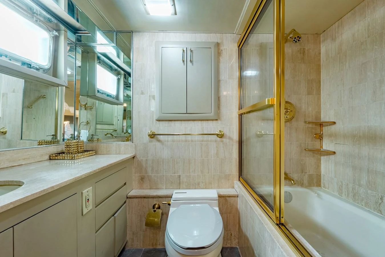 a bathroom with a toilet and a bathtub aboard NYMPHAEA Yacht for Sale