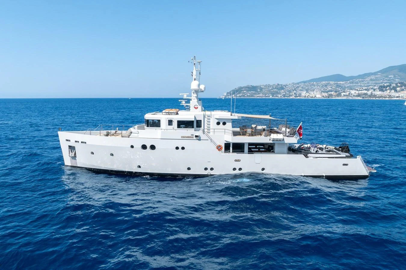 a white boat in the water aboard PREFERENCE 19 Yacht for Sale