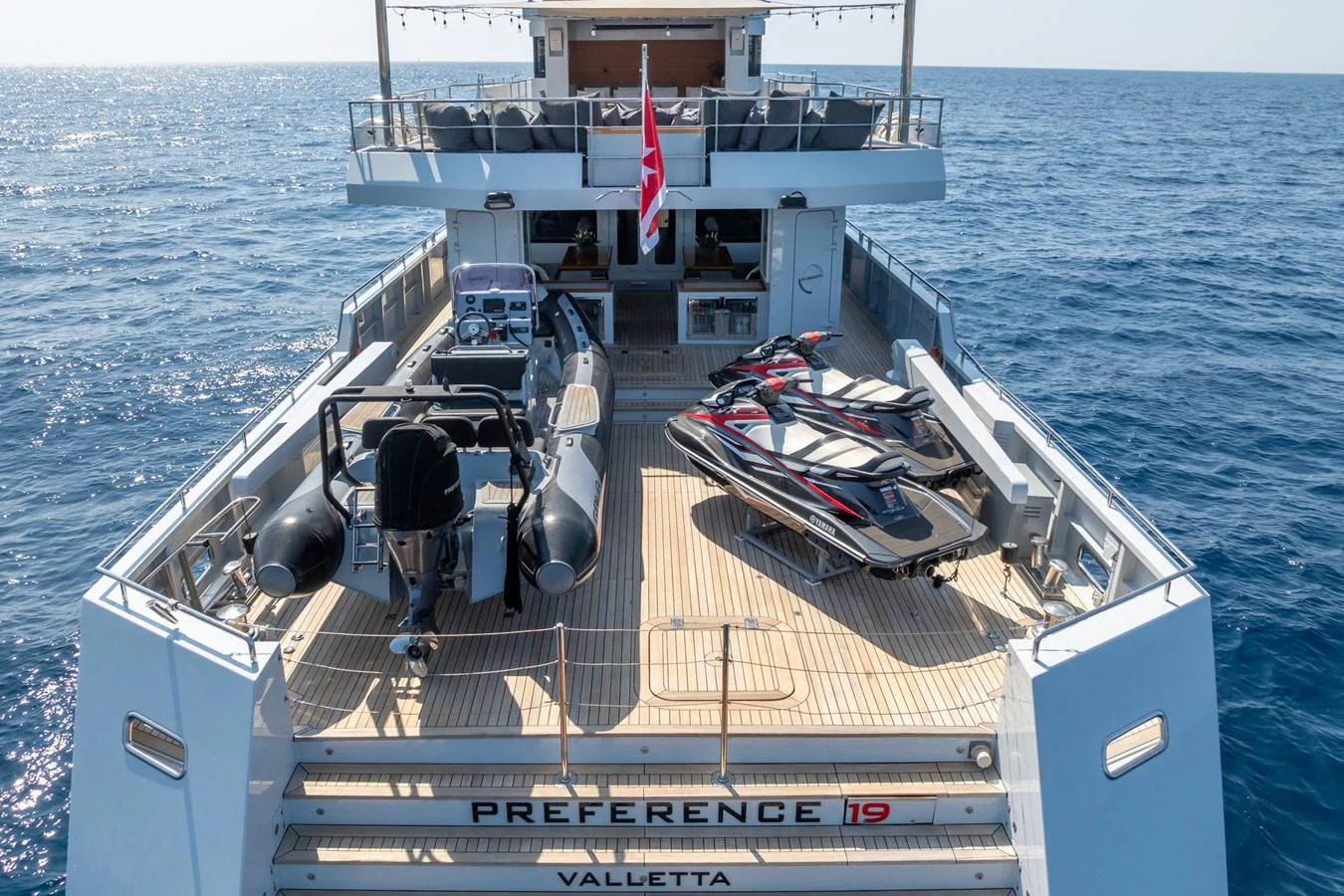 a boat with a ladder on the deck aboard PREFERENCE 19 Yacht for Sale