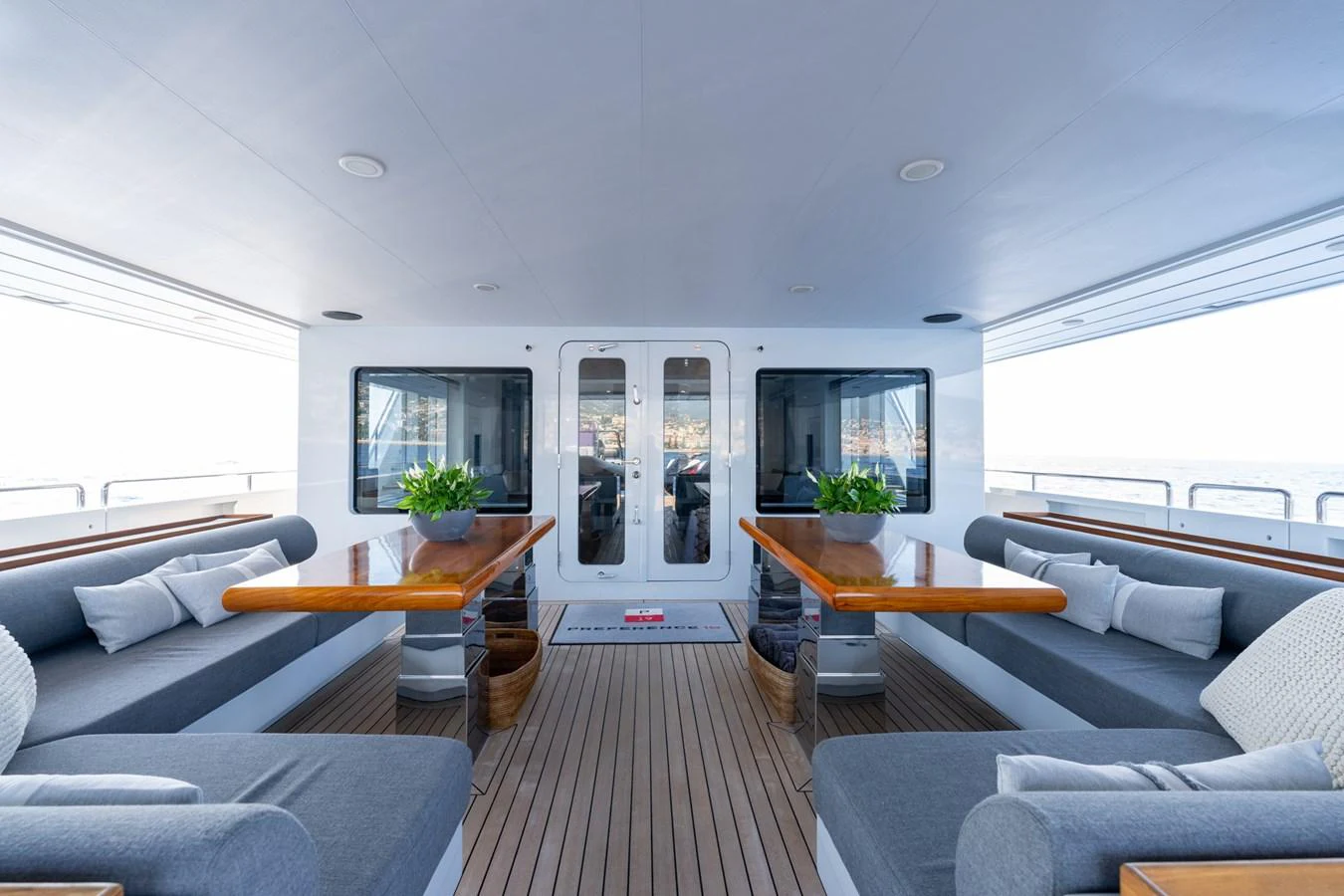 a living room with a large window aboard PREFERENCE 19 Yacht for Sale