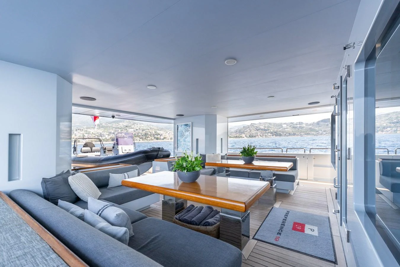 a living room with a large window aboard PREFERENCE 19 Yacht for Sale
