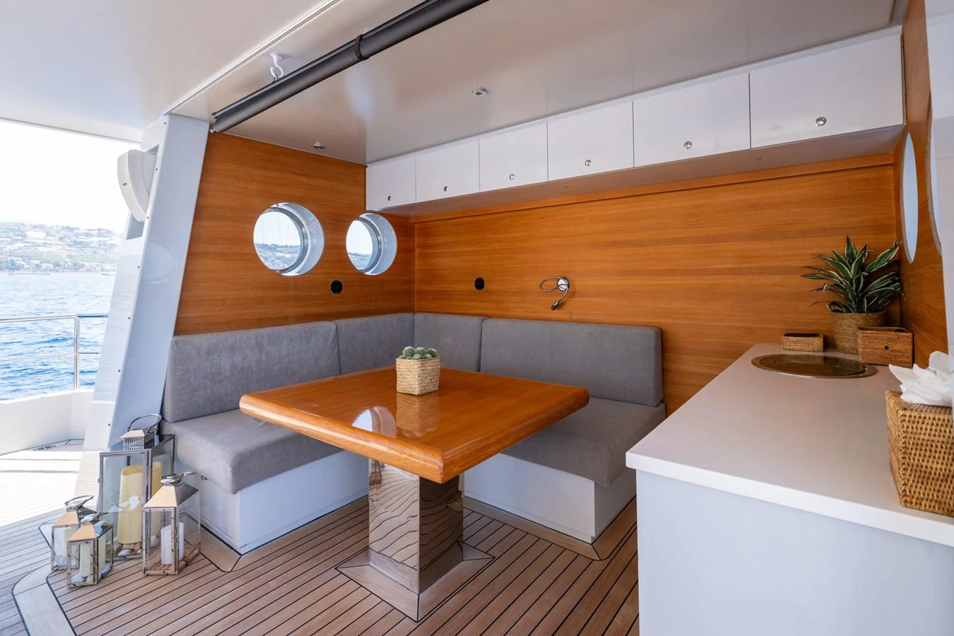 a room with a table and a couch aboard PREFERENCE 19 Yacht for Sale