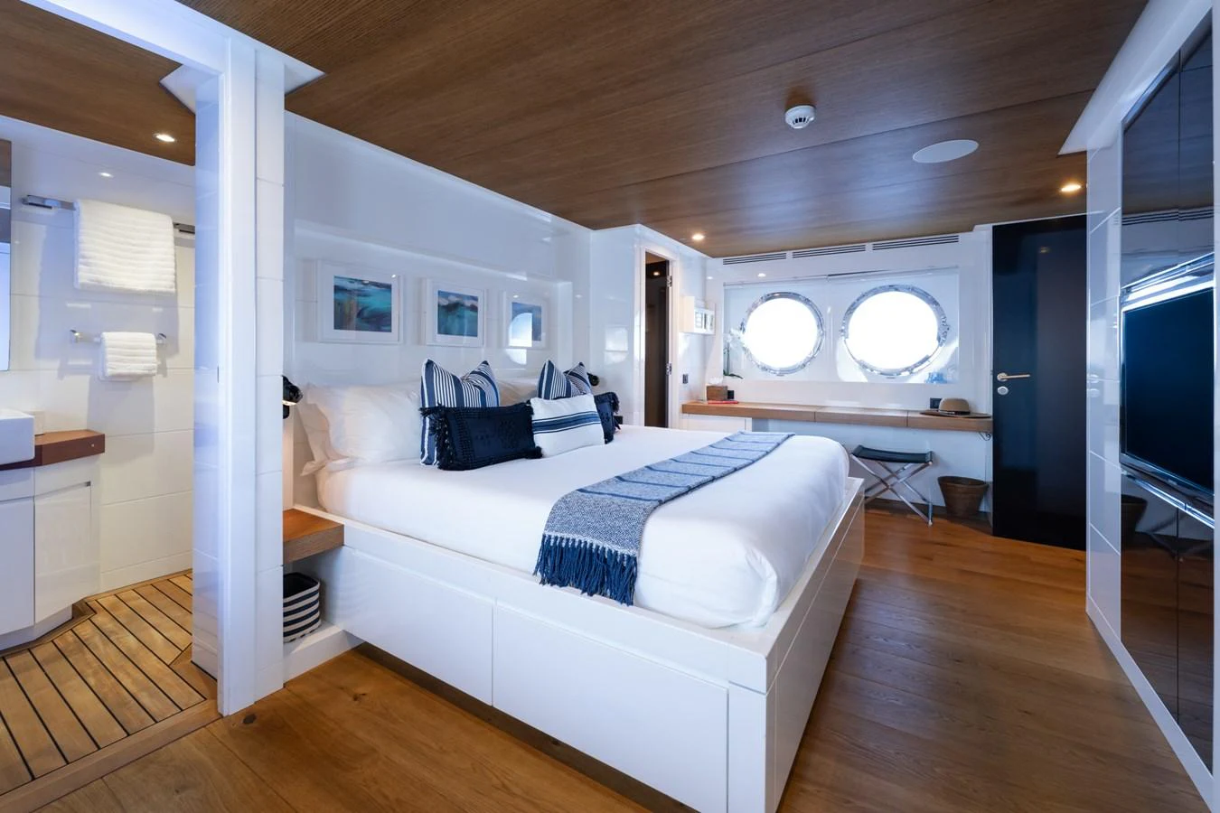 a bedroom with a large bed aboard PREFERENCE 19 Yacht for Sale