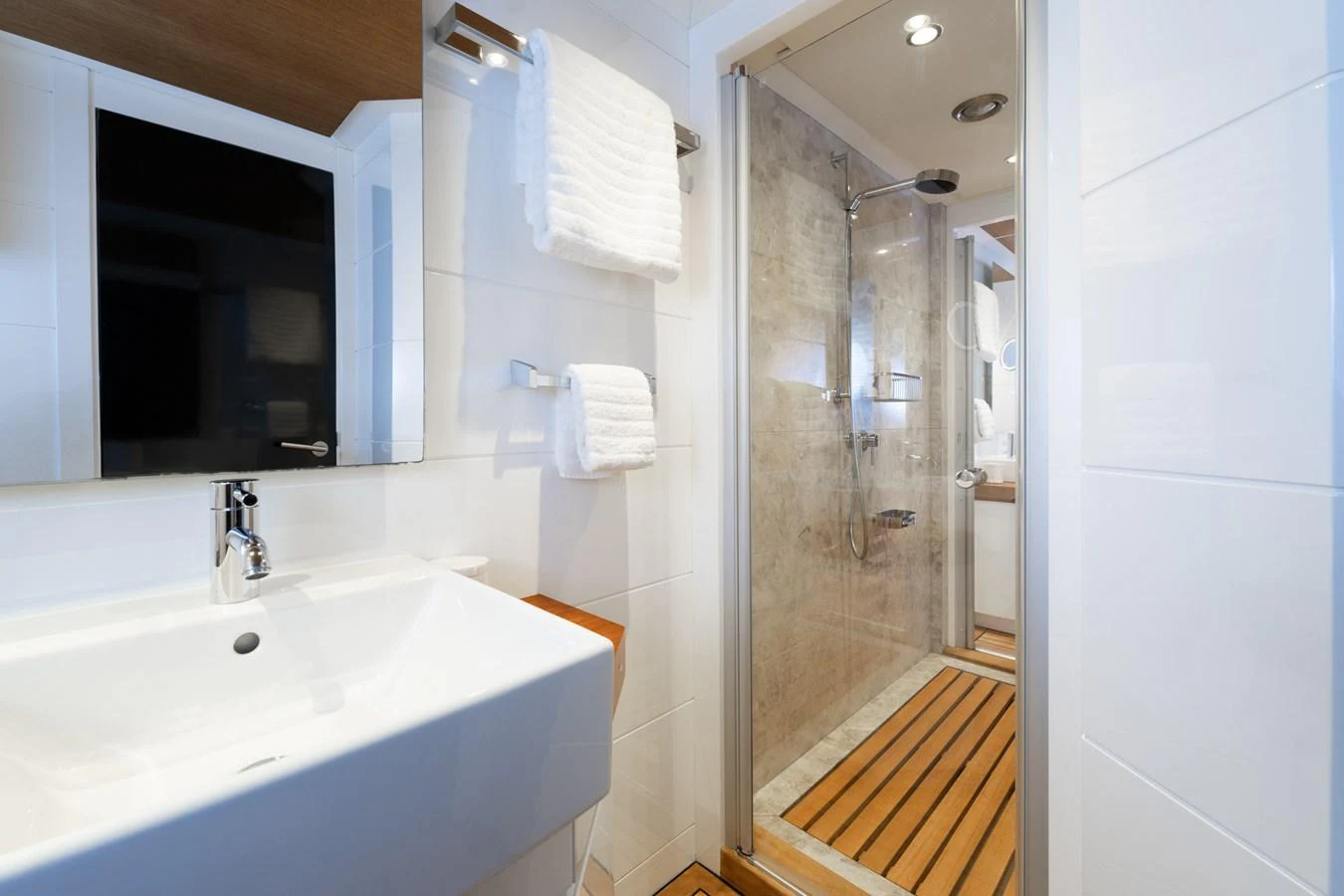 a bathroom with a sink and a shower aboard PREFERENCE 19 Yacht for Sale