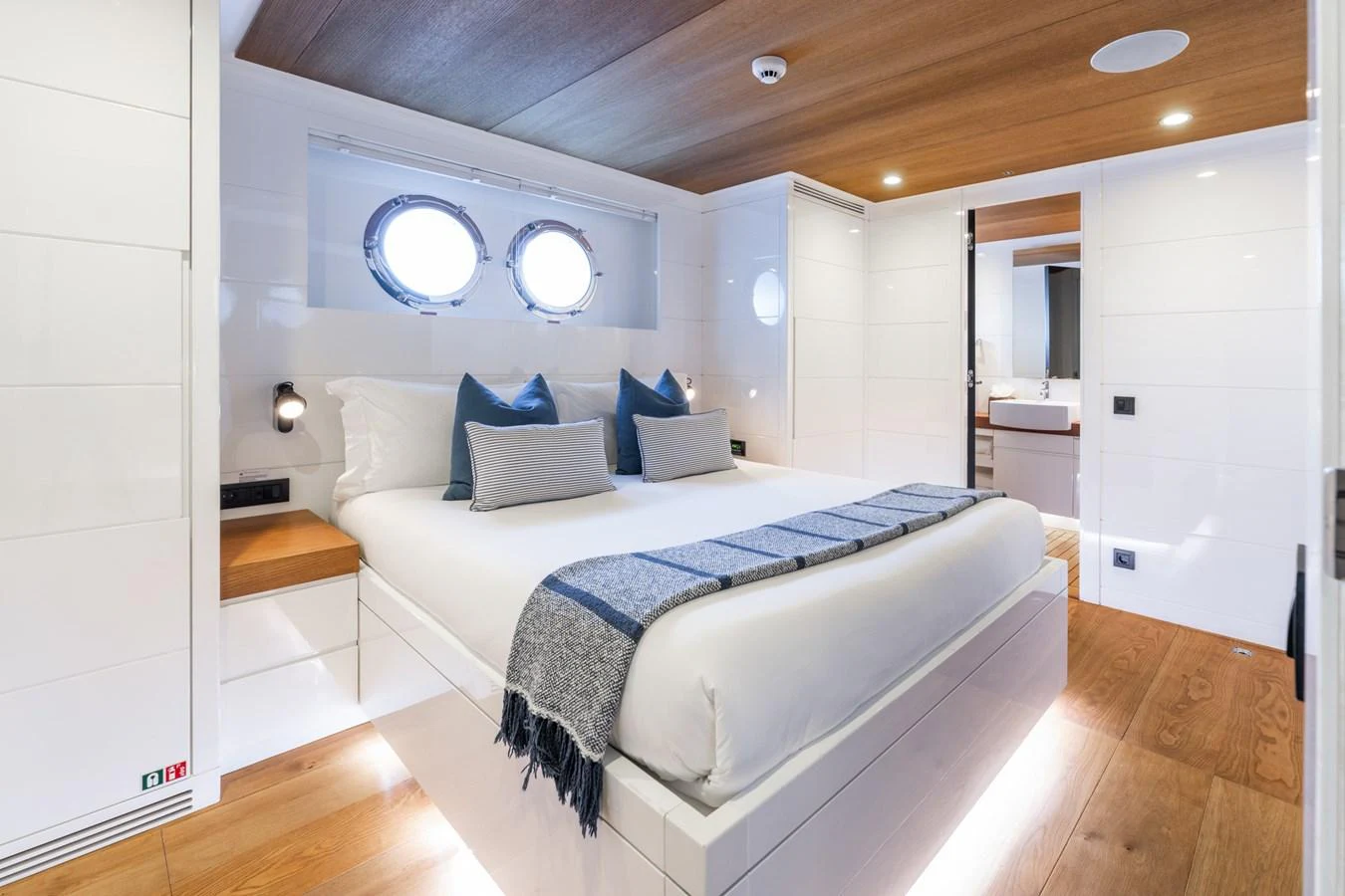 a bed in a room aboard PREFERENCE 19 Yacht for Sale