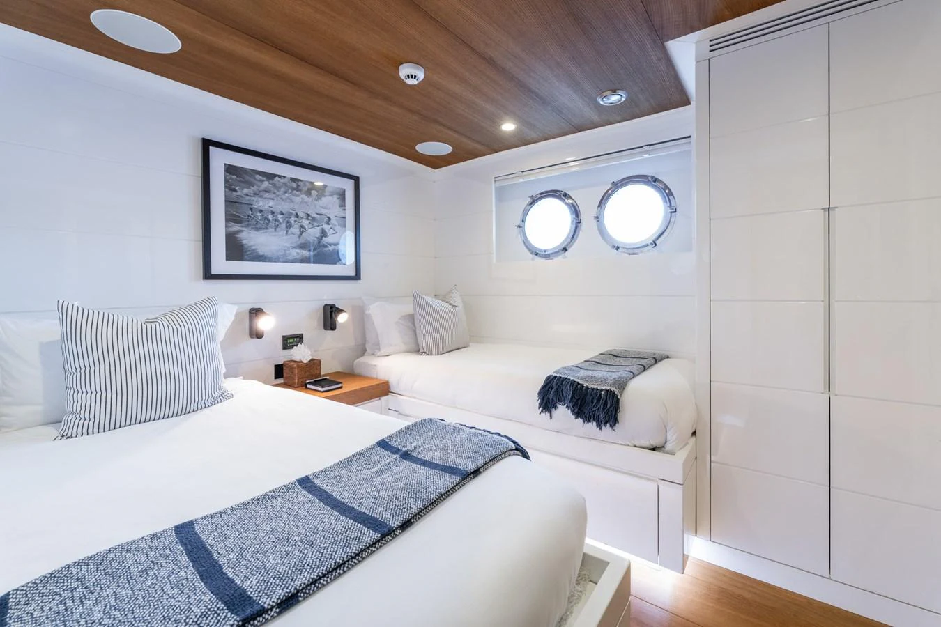 a couple of beds in a room aboard PREFERENCE 19 Yacht for Sale