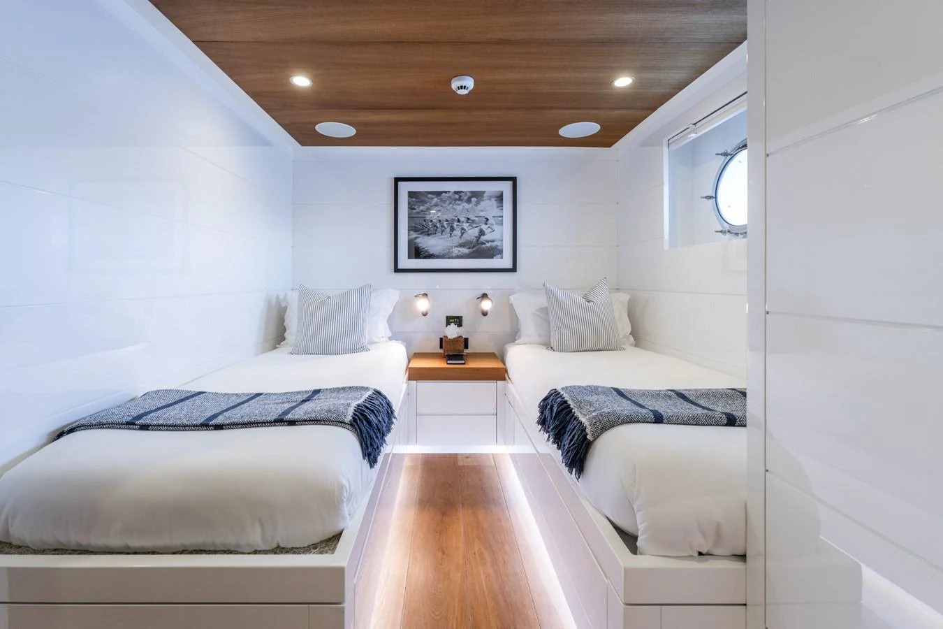 a room with white beds aboard PREFERENCE 19 Yacht for Sale