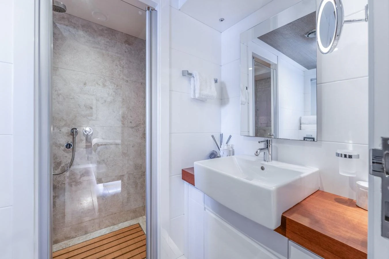 a bathroom with a glass shower aboard PREFERENCE 19 Yacht for Sale