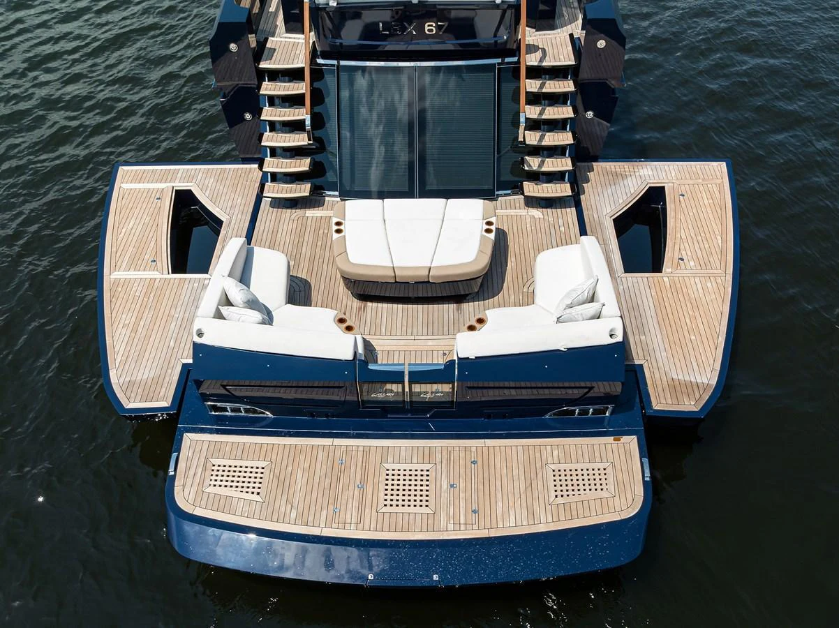 The yacht's aft deck features luxurious seating and ample space for relaxation by the water. aboard LAZZARA LSX 67 Yacht for Sale