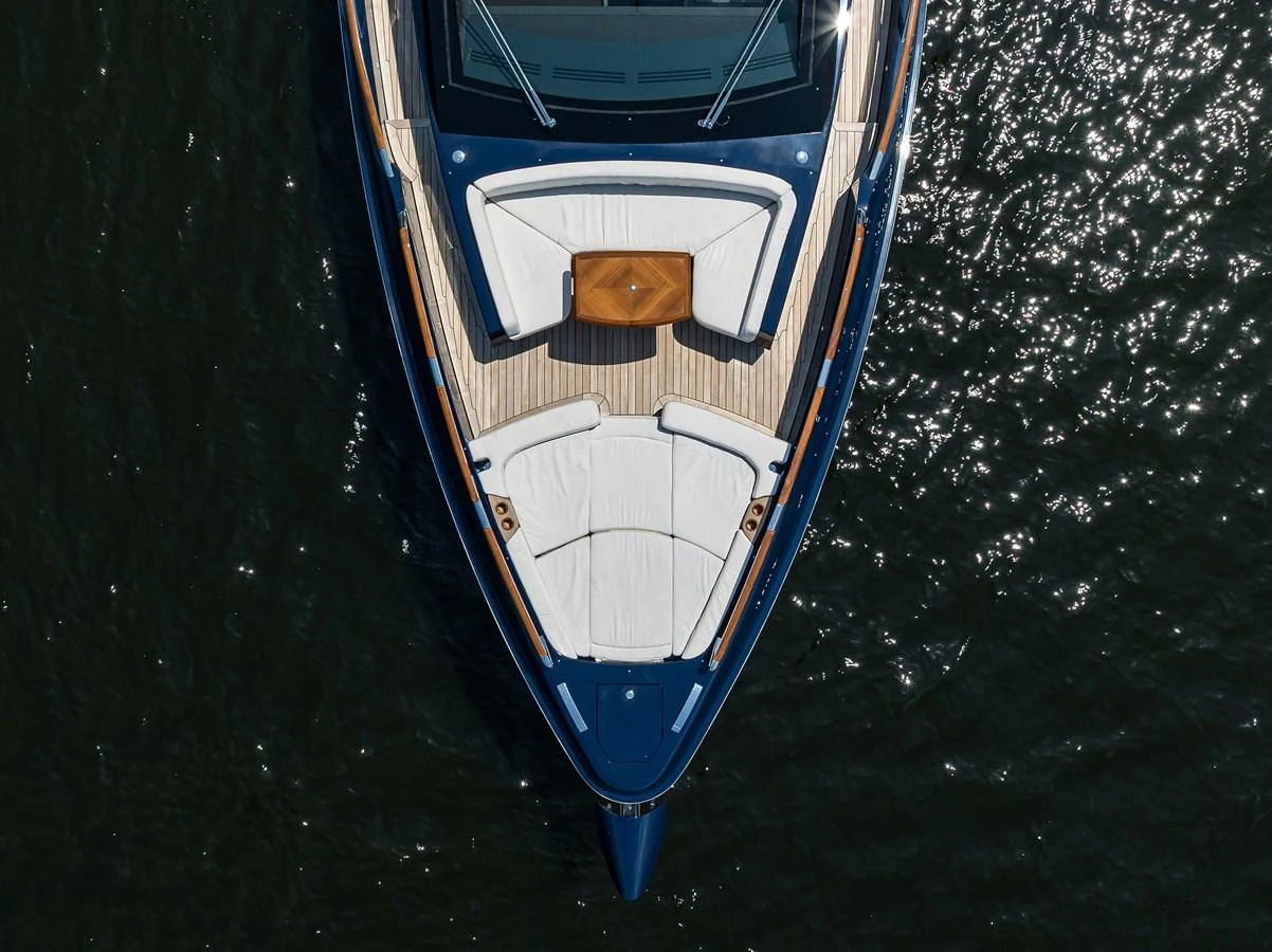 The yacht's foredeck features luxurious sun pads and a stylish seating area, perfect for relaxation. aboard LAZZARA LSX 67 Yacht for Sale