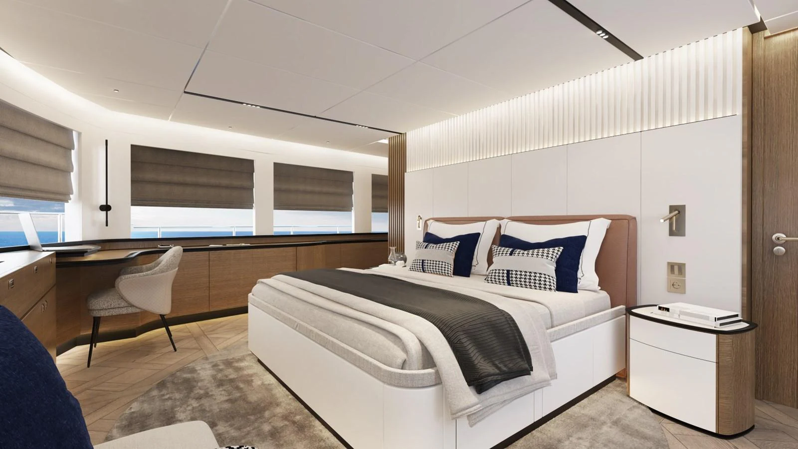 The stateroom features a luxurious bed with elegant bedding, complemented by modern furnishings and ample natural light. aboard STELLARONE ST88/01 Yacht for Sale