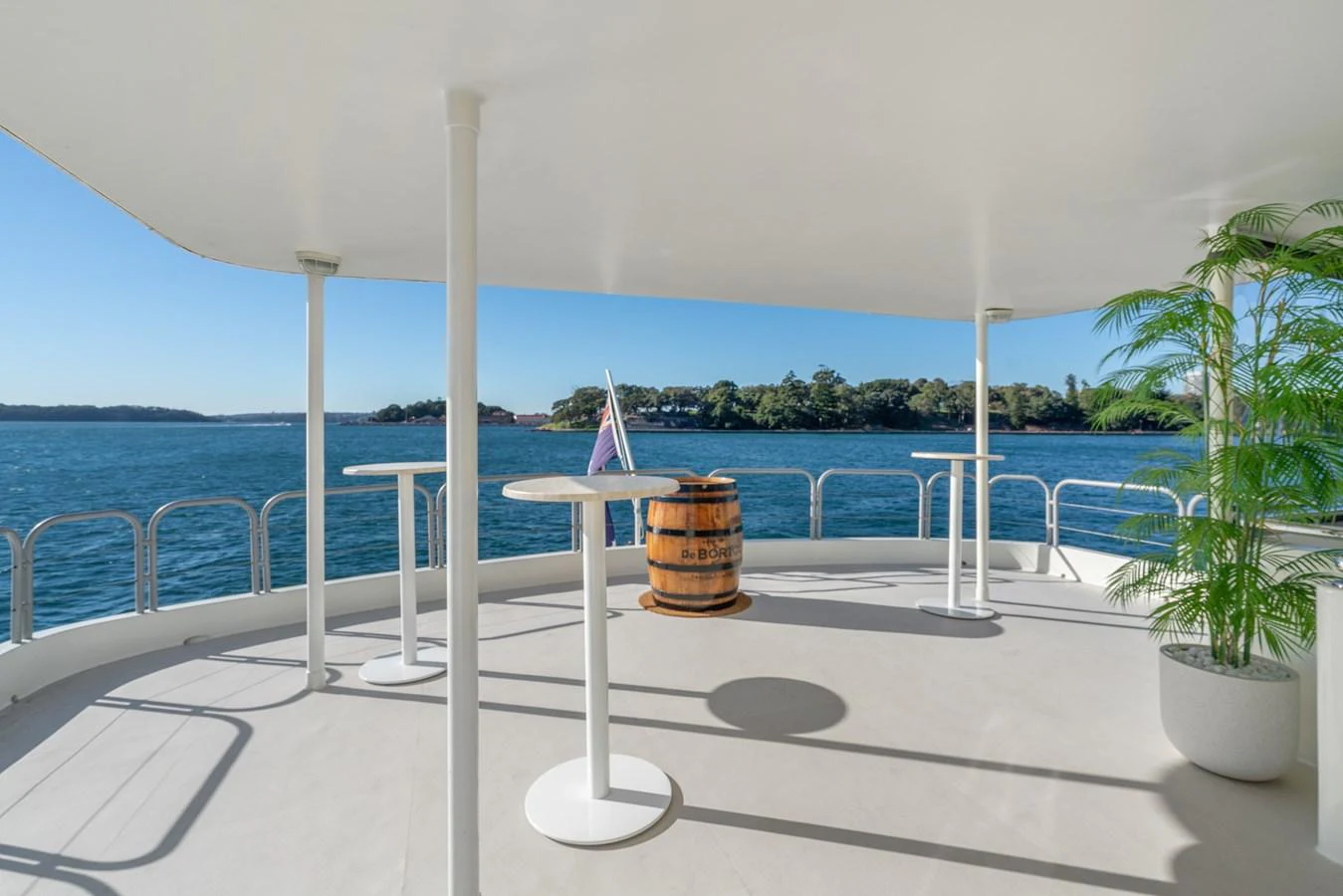 The aft deck offers a spacious and serene area with stunning views of the surrounding water. aboard COAST Yacht for Sale