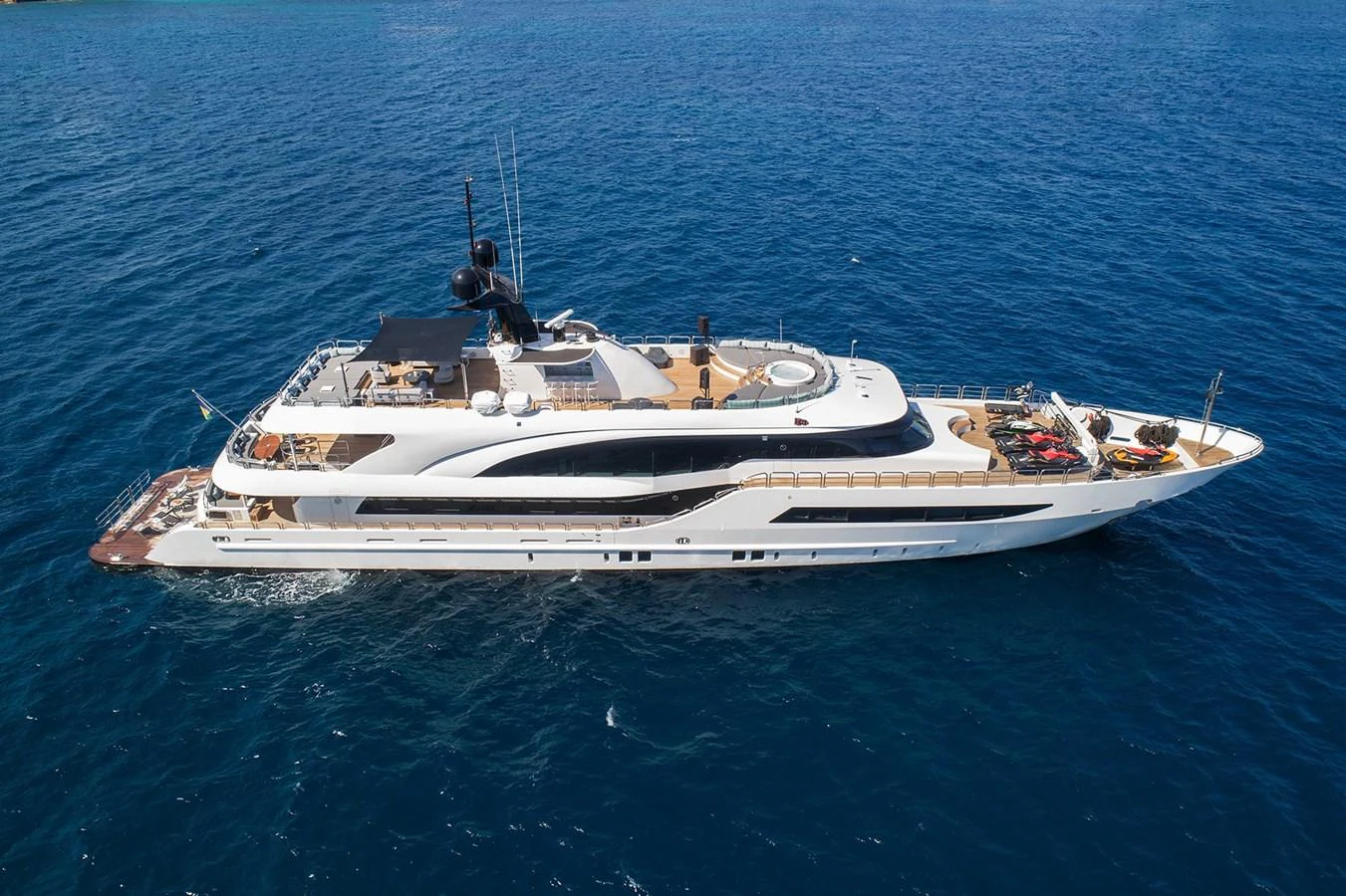a white boat in the water aboard HALLO Yacht for Sale