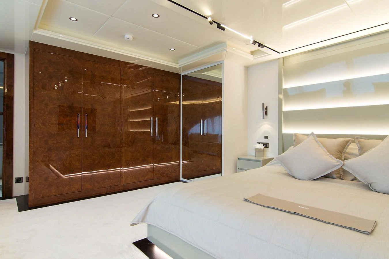 a bed in a room aboard HALLO Yacht for Sale