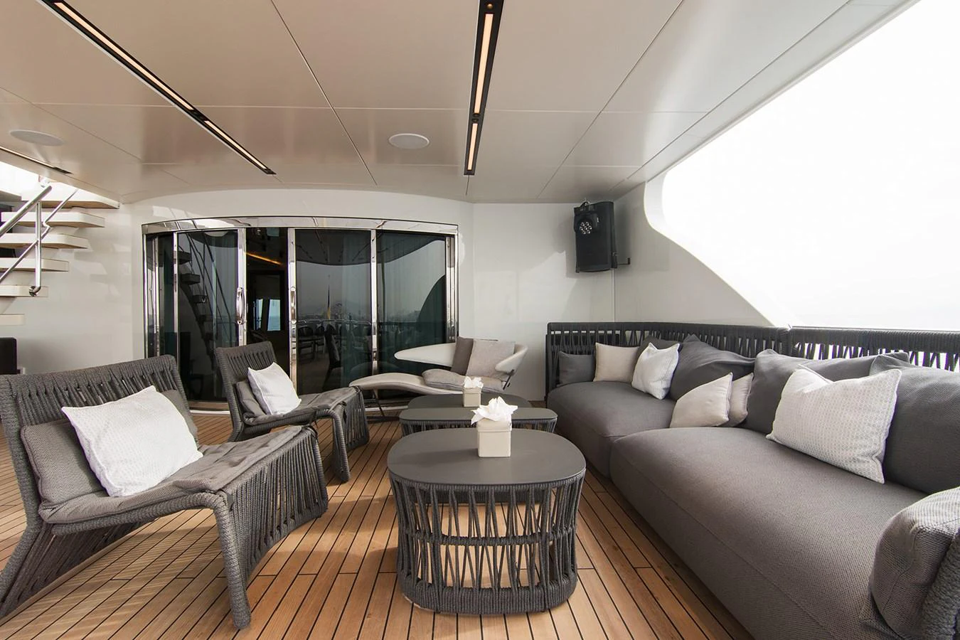a living room with a large window aboard HALLO Yacht for Sale