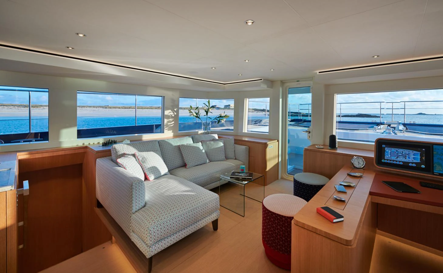 The salon offers a spacious and modern seating area with panoramic views of the surrounding waters. aboard LONG ISLAND 78 Yacht for Sale