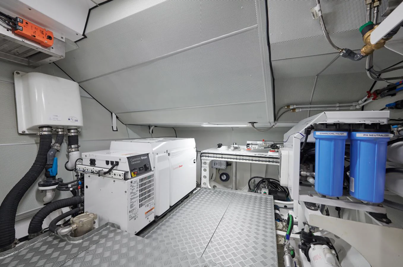 The image showcases the yacht's well-organized and clean engine room with advanced machinery and equipment. aboard LONG ISLAND 78 Yacht for Sale