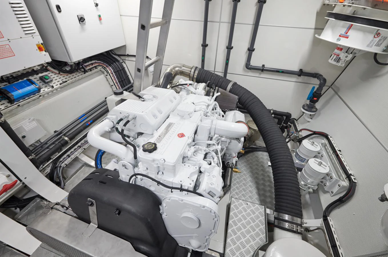 The engine room showcases a meticulously maintained and powerful engine setup. aboard LONG ISLAND 78 Yacht for Sale