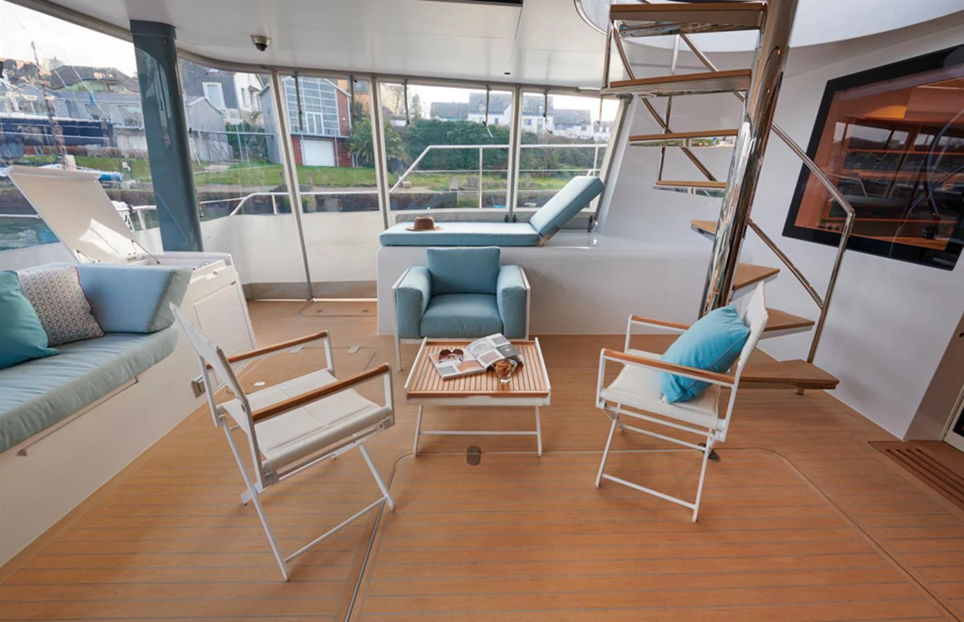 The aft deck features comfortable seating with a view, perfect for relaxation and socializing. aboard LONG ISLAND 78 Yacht for Sale