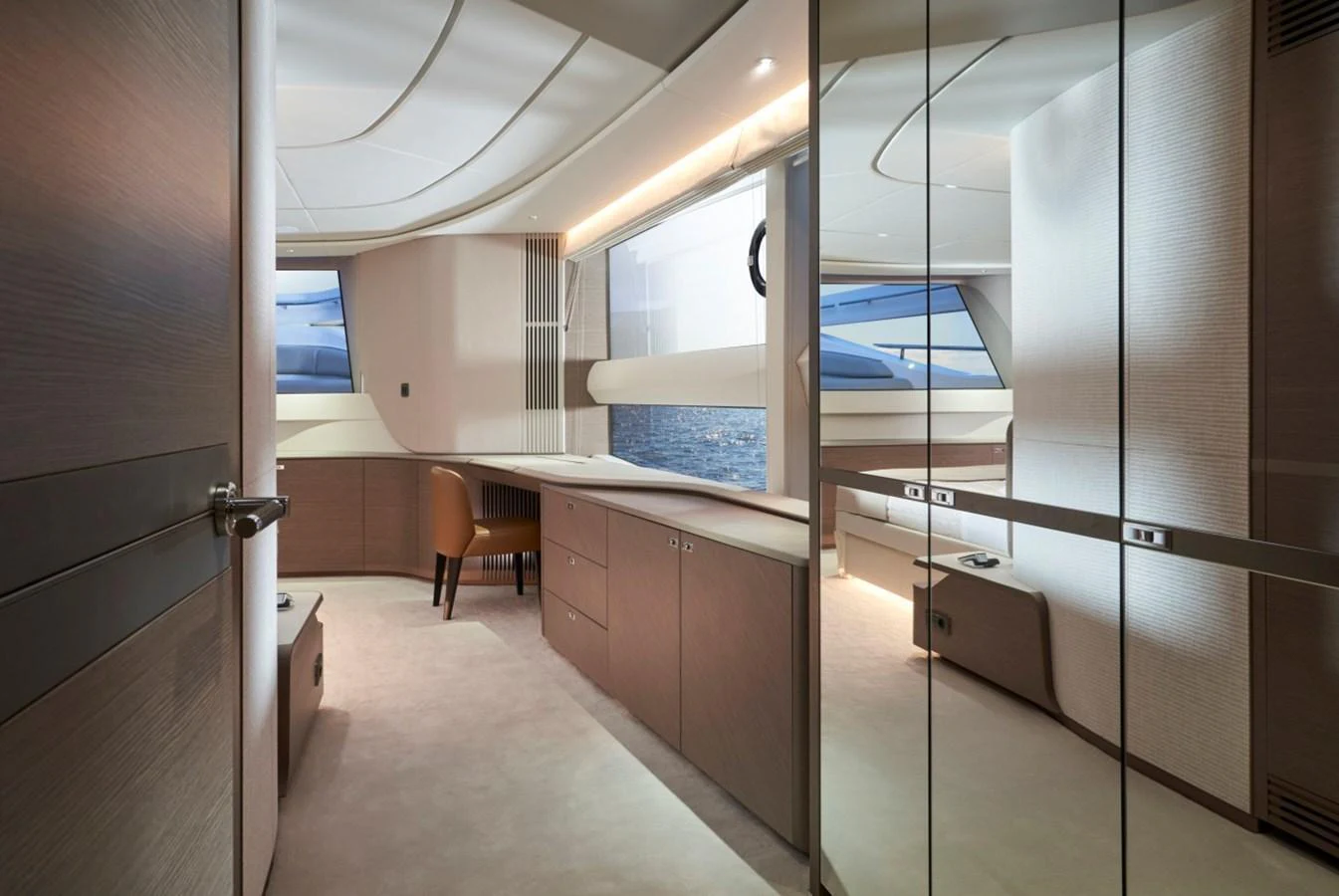 The yacht's interior features a sleek, modern design with ample natural light and luxurious finishes. aboard OCEAN THREE Yacht for Sale