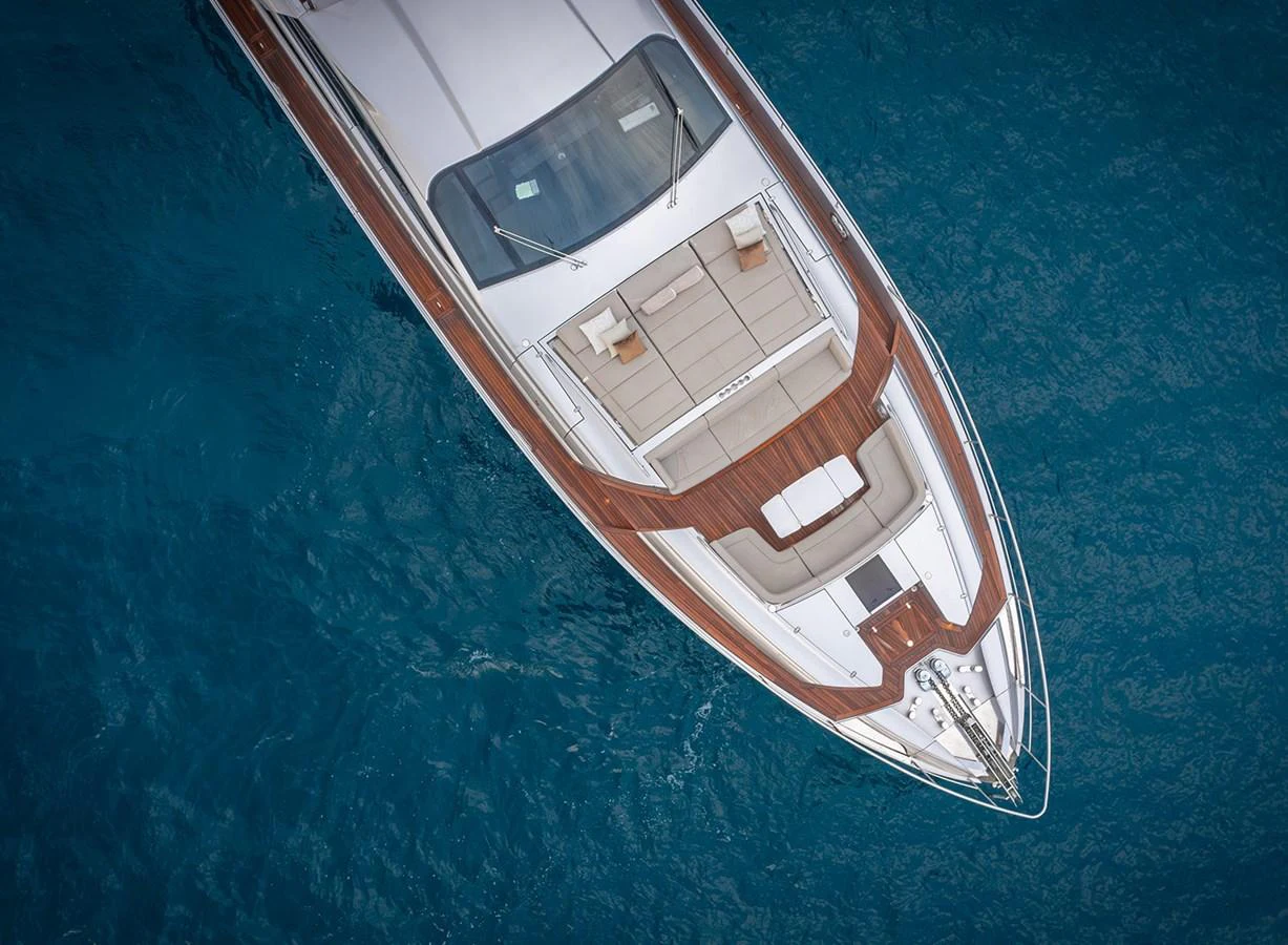 The yacht's foredeck features elegant teak decking and comfortable seating areas, perfect for relaxation. aboard MAGIC OF AYR Yacht for Sale