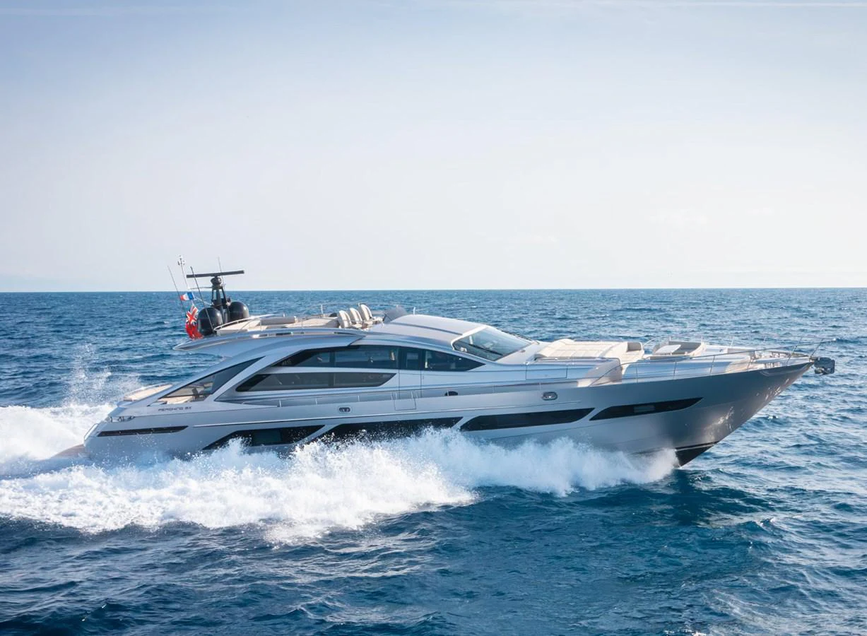 A sleek and modern yacht glides swiftly across the open sea, showcasing its elegant design and powerful performance. aboard MAGIC OF AYR Yacht for Sale