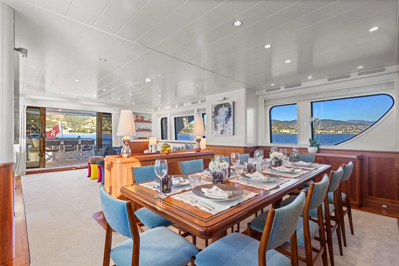 a dining room with a table and chairs aboard ARCHIPELAGO Yacht for Sale