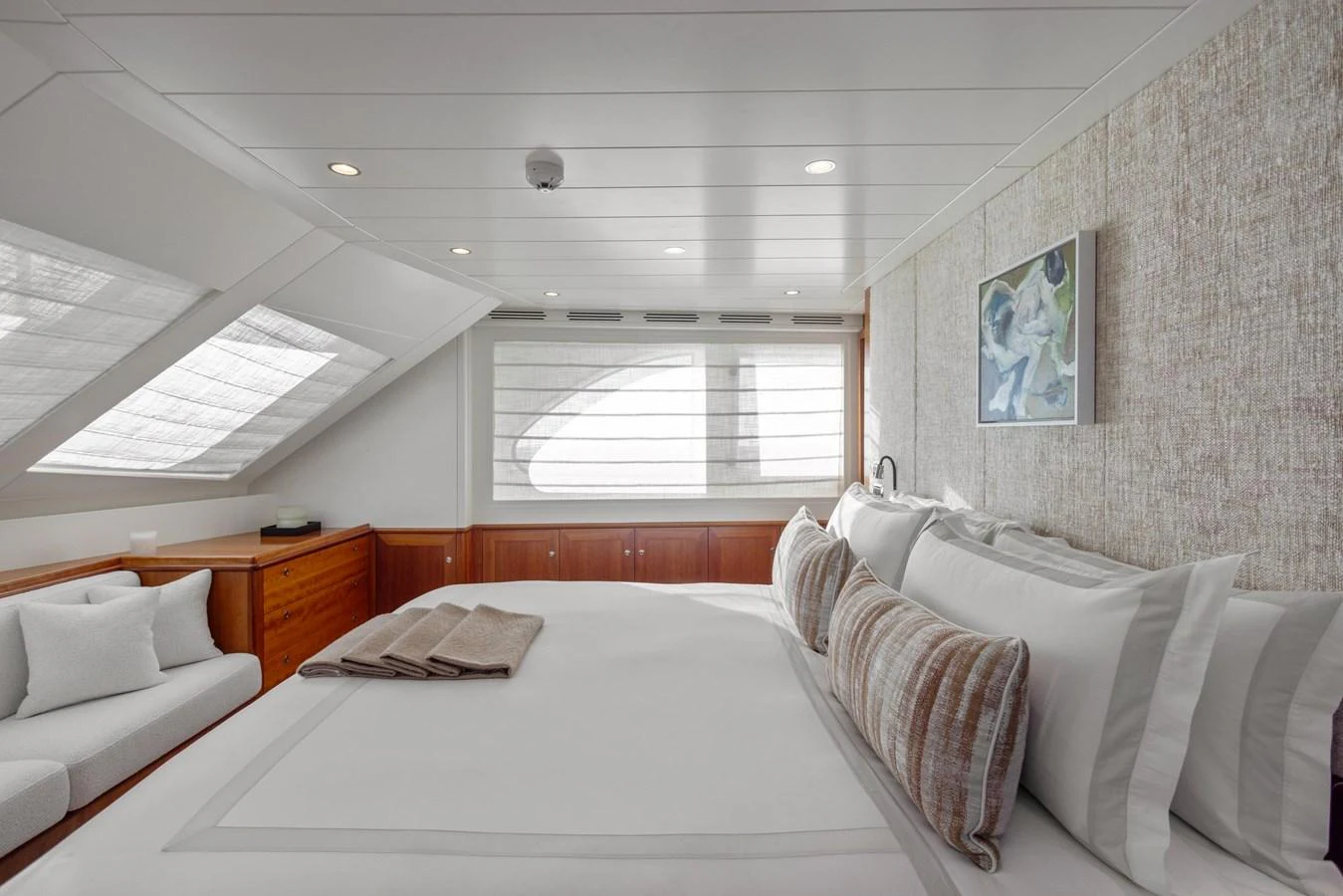 a room with a bed and a window aboard ARCHIPELAGO Yacht for Sale