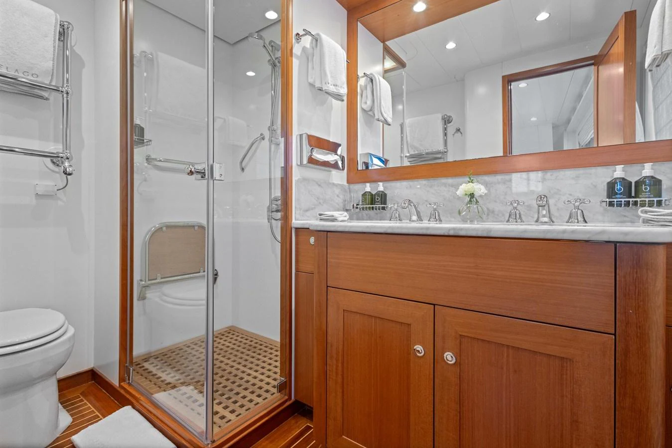 a bathroom with a glass shower aboard ARCHIPELAGO Yacht for Sale
