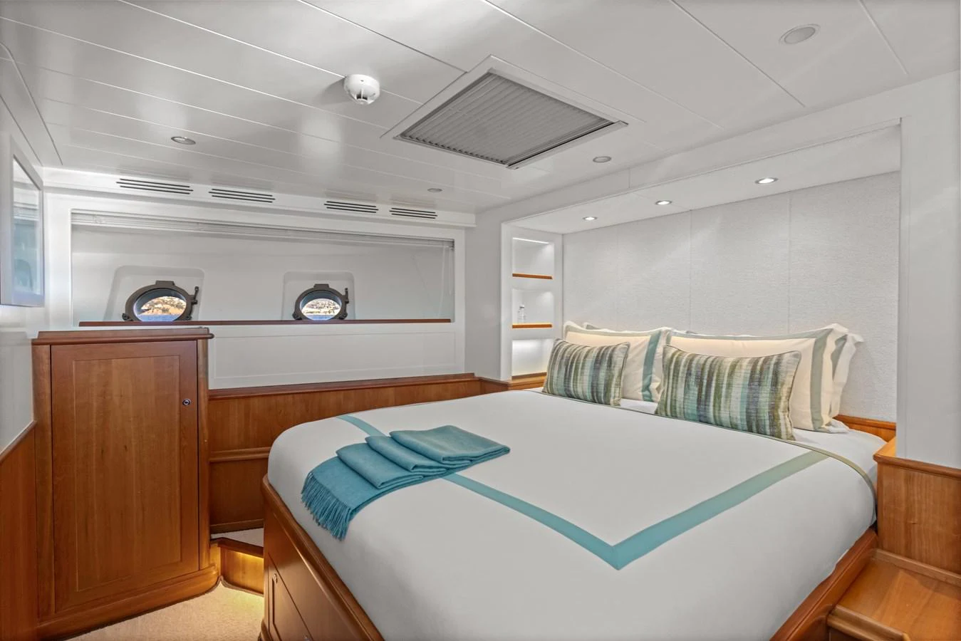 a bedroom with a bed and a tv aboard ARCHIPELAGO Yacht for Sale