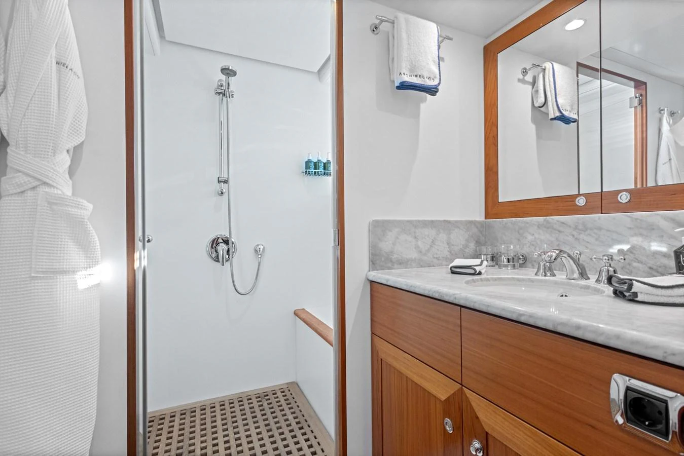 a bathroom with a sink and a mirror aboard ARCHIPELAGO Yacht for Sale