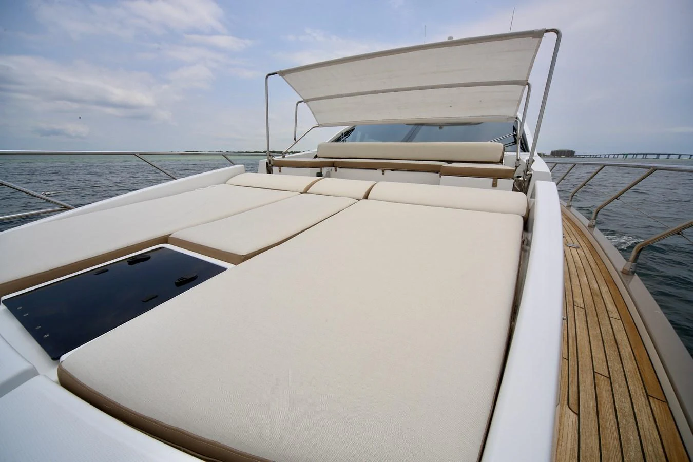 The yacht's foredeck features luxurious sun pads for ultimate relaxation. aboard KIKI Yacht for Sale