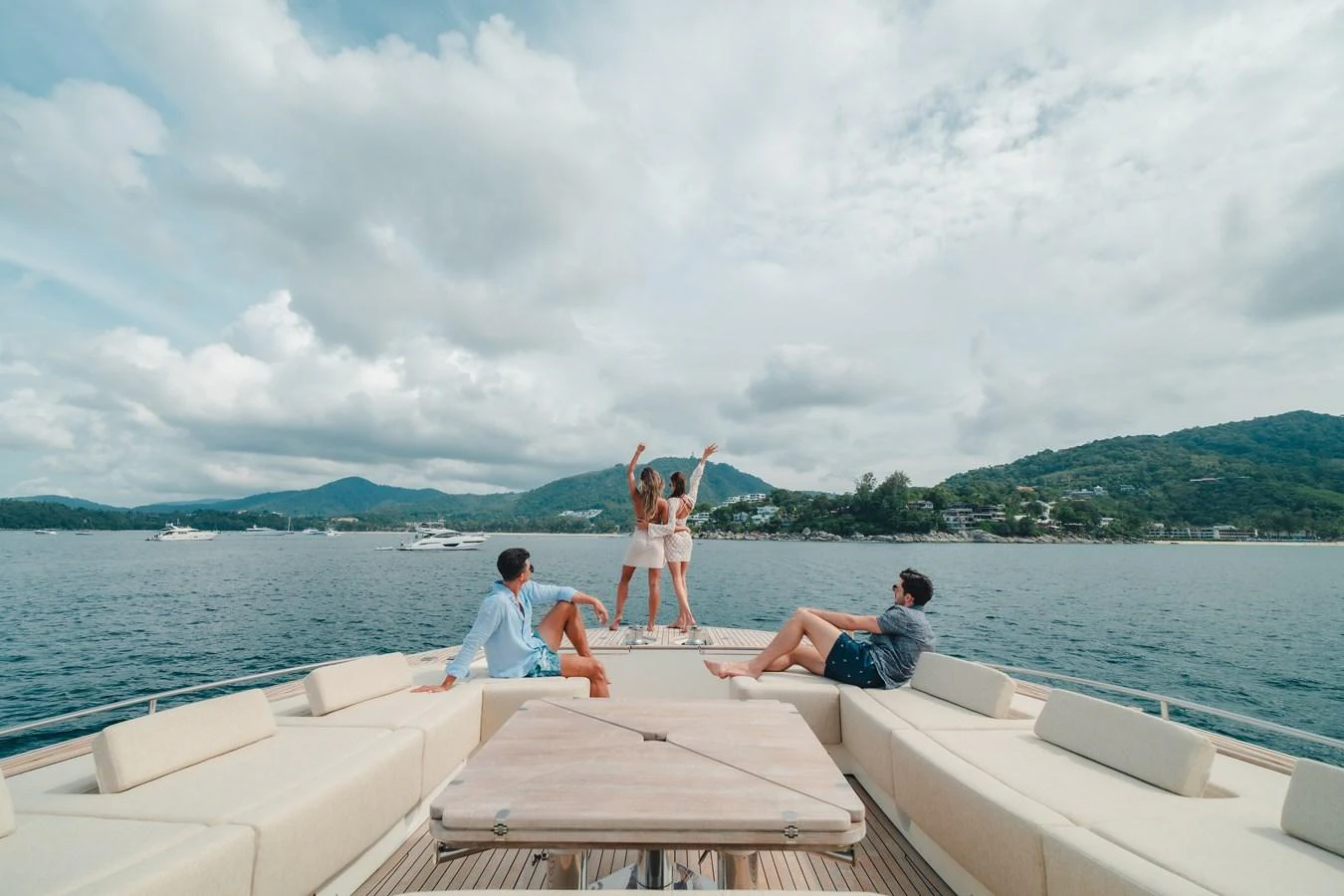 a group of people on a boat aboard MOANA Yacht for Sale