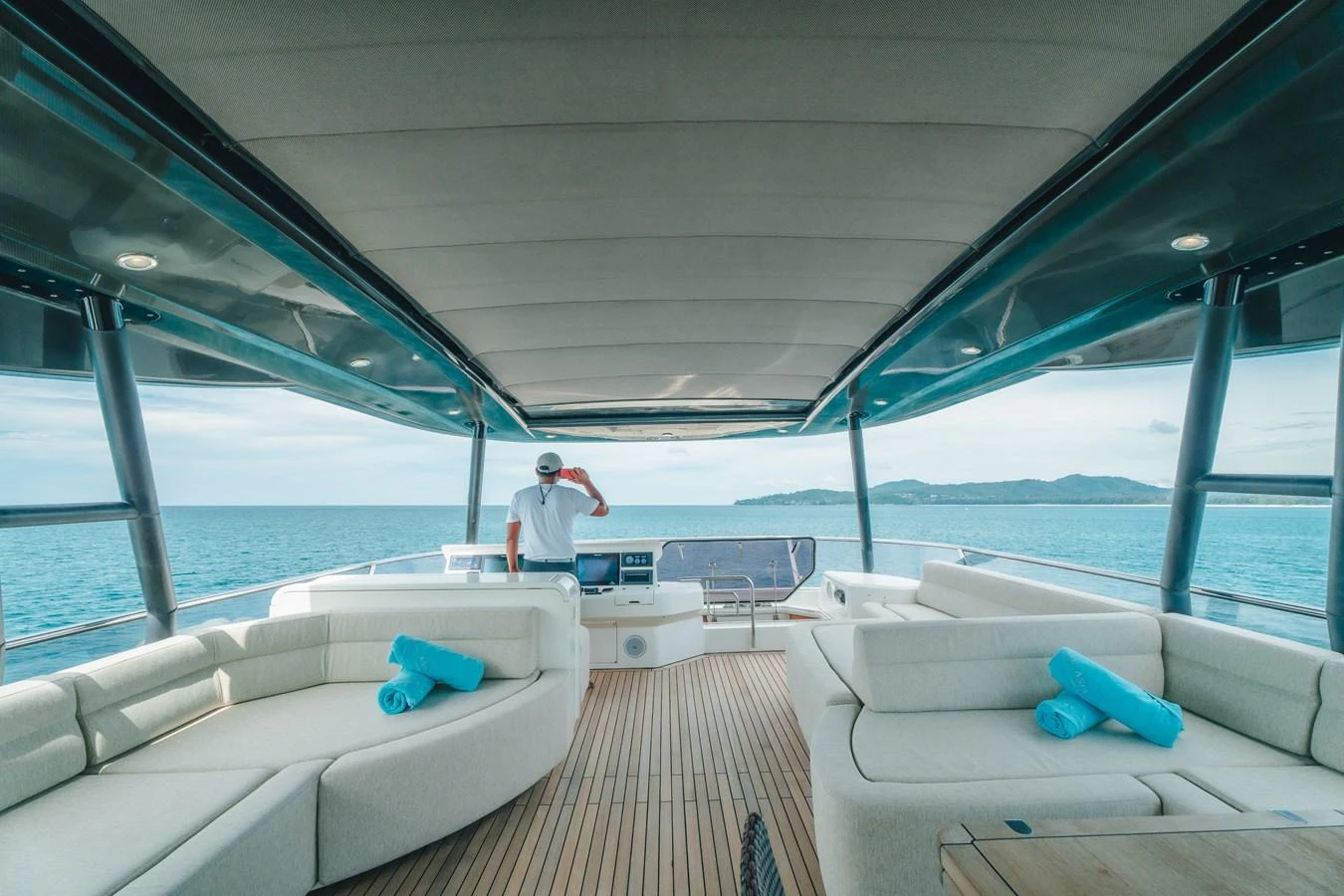 a person sitting on a boat aboard MOANA Yacht for Sale