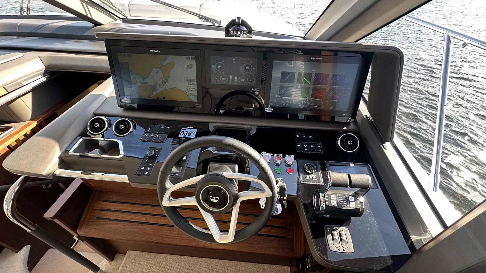 The helm station features advanced navigation equipment and luxurious finishes. aboard PRINCESS F65 Yacht for Sale