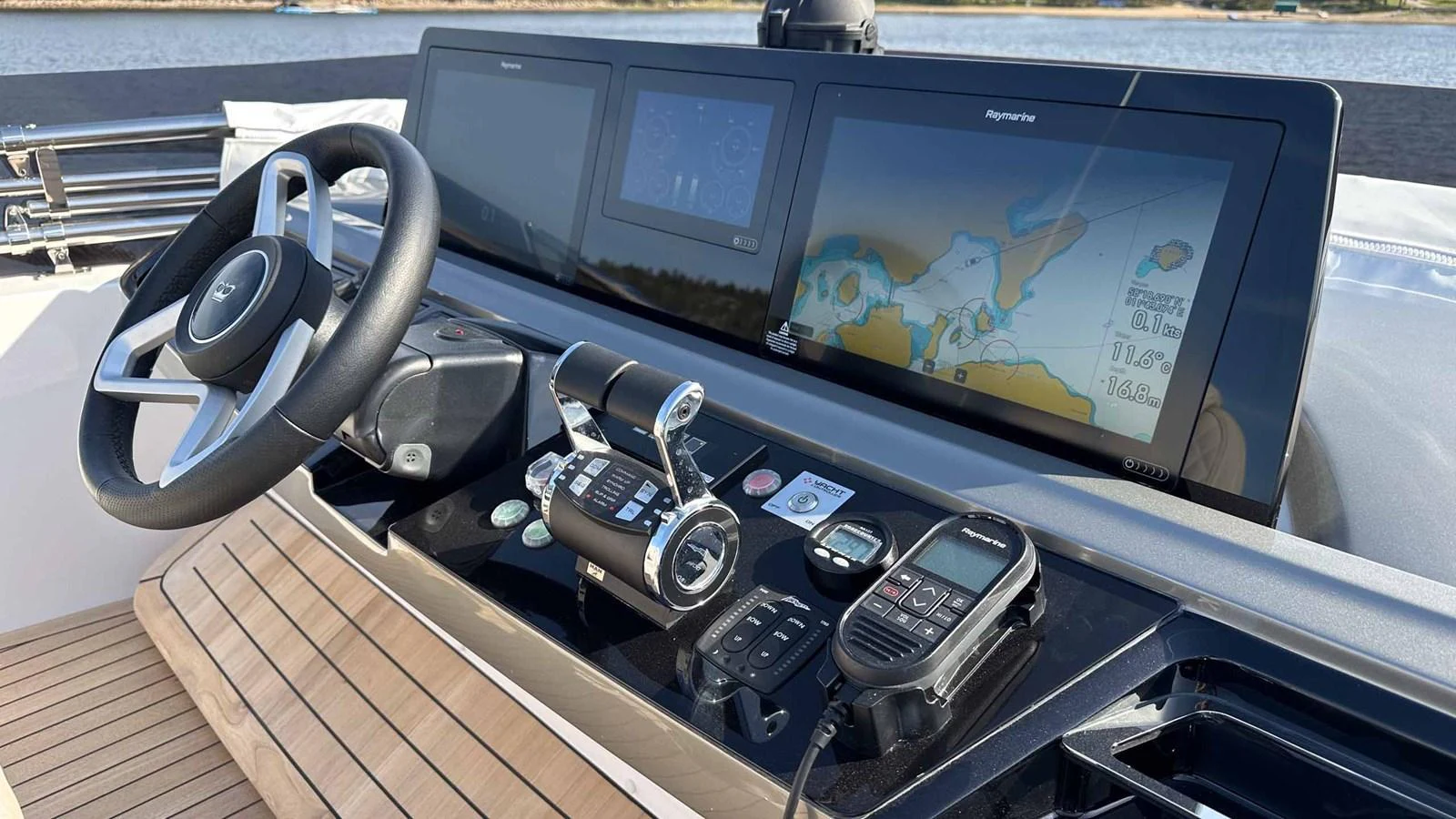 The helm station features advanced navigation and control systems with a sleek, modern design. aboard PRINCESS F65 Yacht for Sale
