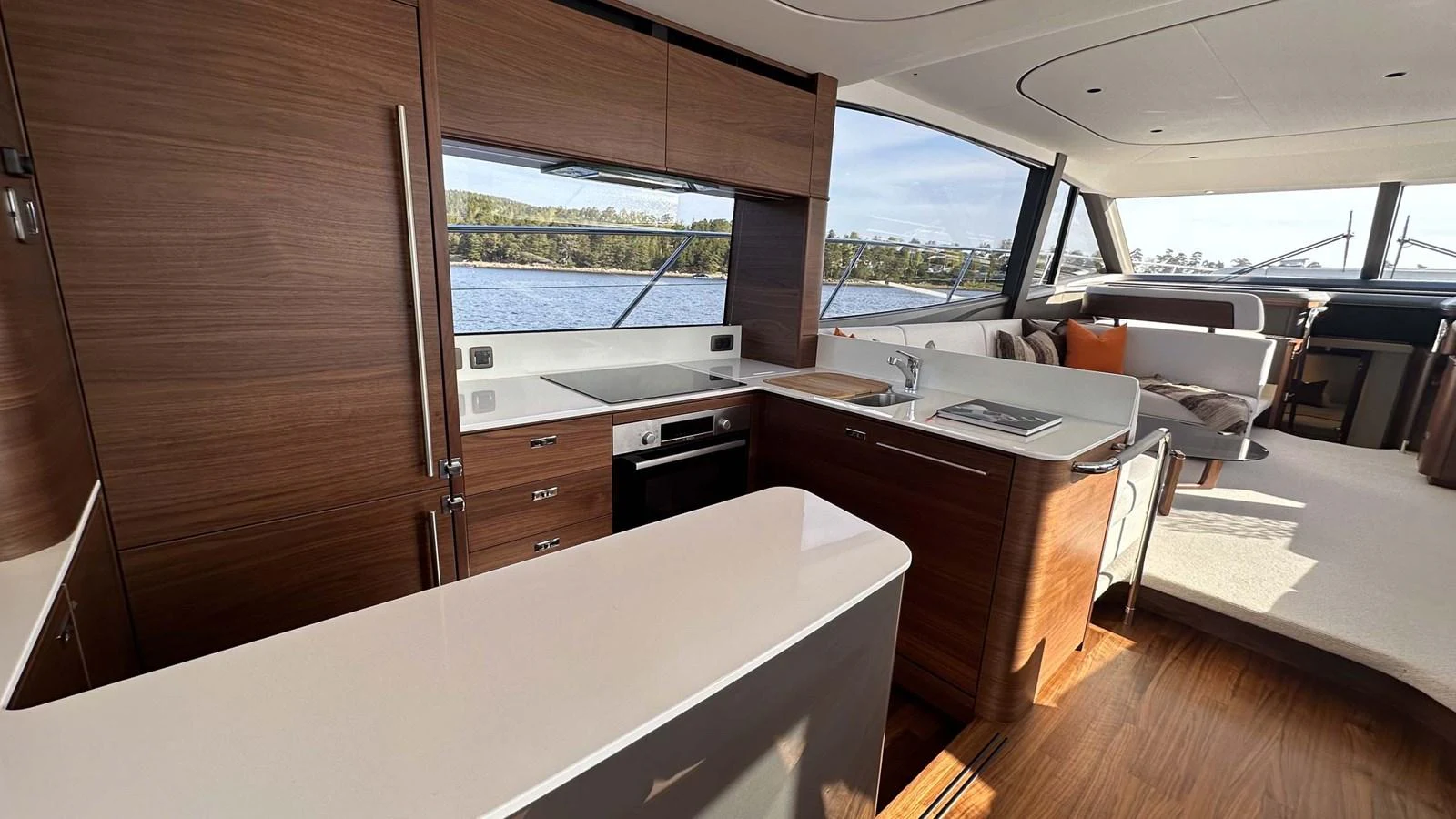 The yacht's galley features modern appliances and a sleek design with ample natural light. aboard PRINCESS F65 Yacht for Sale